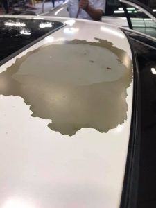 Peeling white car